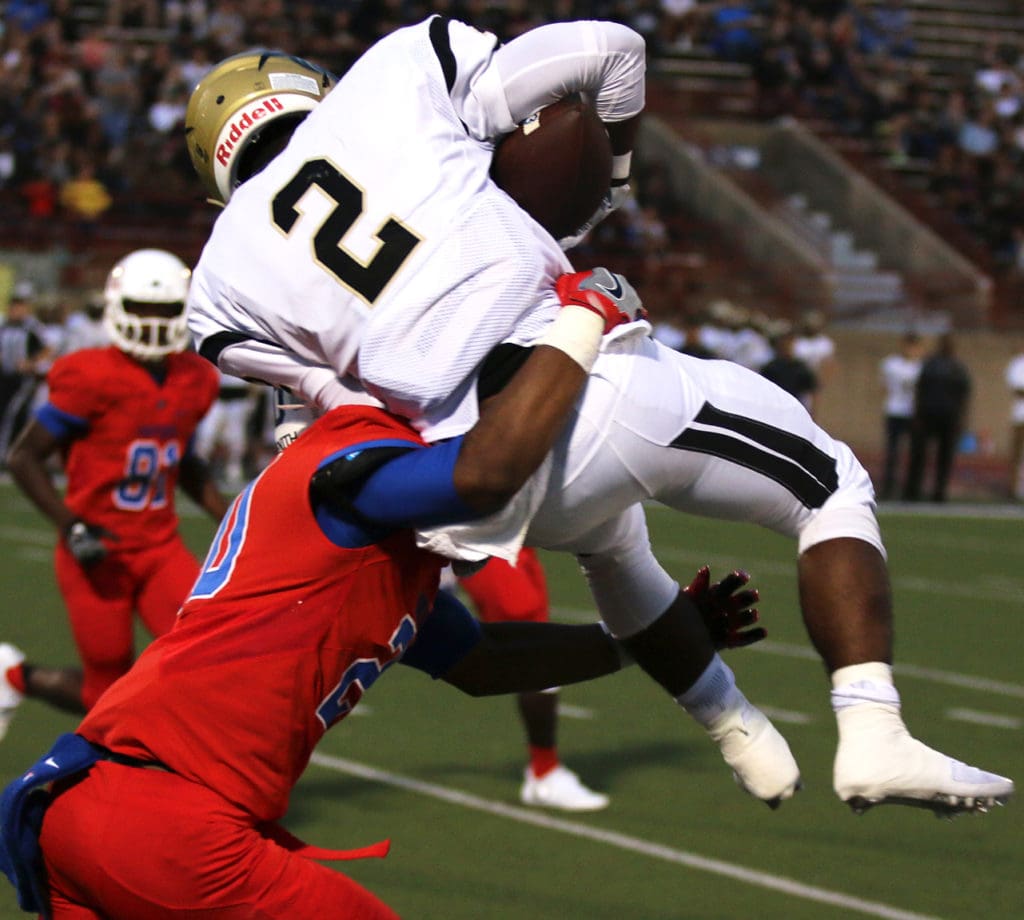 Sophomore Javon Fountain makes a big hit on Plano West’s Wide Receiver. Duncanville won the game 36-32. (Ricardo Martin/Duncanville High School)