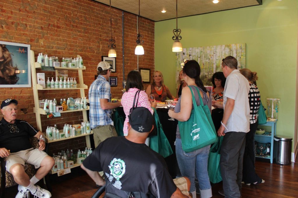 Midlothian businesses in the Historic Downtown District host wine stops during the 2015 Midlothian WIne and Arts Festival. 