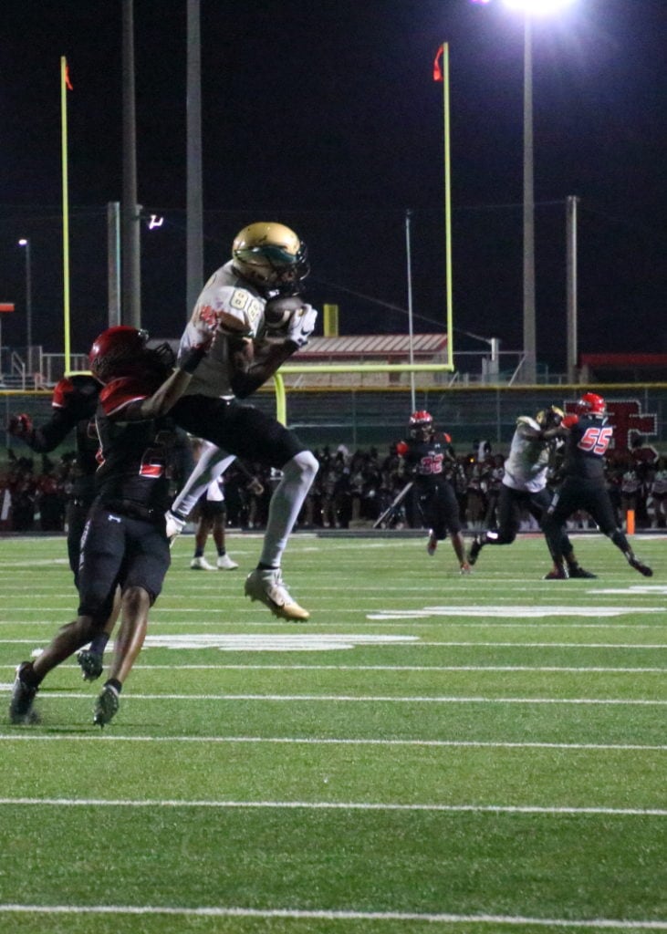 Emmet Perry hauls down a pass on the 35 yard line as the Eagles defeat the Cedar Hill’s Longhorns on Friday, September 23, 2016.
