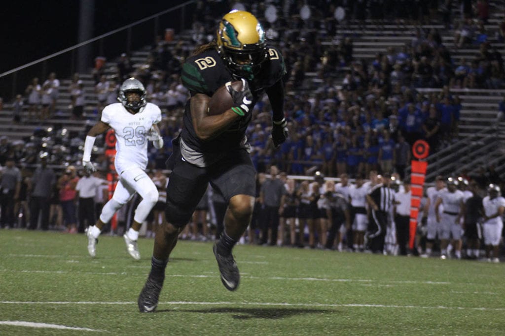 DeSoto wide receiver Laviska Shenault Jr. runs a 61 yard pass from Shawn Robinson to make the score 43 – 7. (Haley Arispe/DeSoto High School)