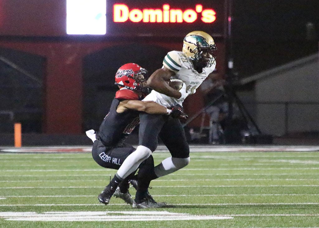 Sam Hunter hauls in pass to move the chains in the 3rd quarter of the game. After several game delays, Cedar Hill threatened to score several times. DeSoto defenders stopped them each time on Friday, September 23, 2016. Haley Arispe/DeSoto High School