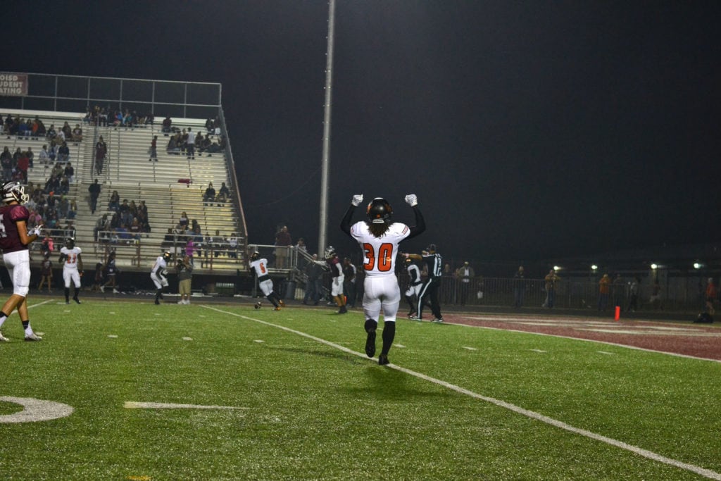 Lancaster High School defensive back Dimitri Miles (30, foreground) and Taiyoun Nichols (6, background), linebacker janarieon Reynolds (23, background) react to a Red Oak pass being broken-up near the goal line October 21, 2016. The Lancaster Tigers beat the Hawks 46-7 at Red Oak's Billy Goodloe Stadium. (Photo by Alexis Thames/Tiger Student Media} 