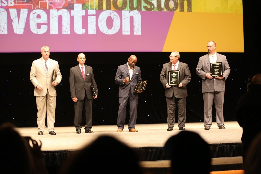 Board President Ty G. Jones accepts the award at the recent Texas Association of School Board Convention.