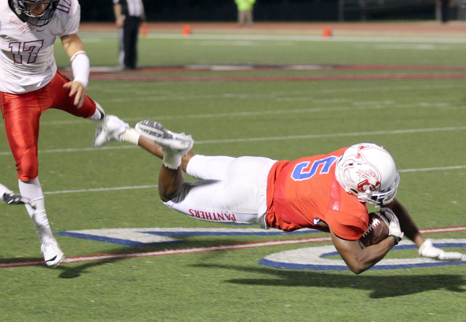 Duncanville Wide Receiver Tre Siggers dives for a catch at the Harker 20 yard line. Siggers gained 64 yards in the Panthers 24-7 win Friday, November 11 at home. (Jose Sanchez/Duncanville High School)