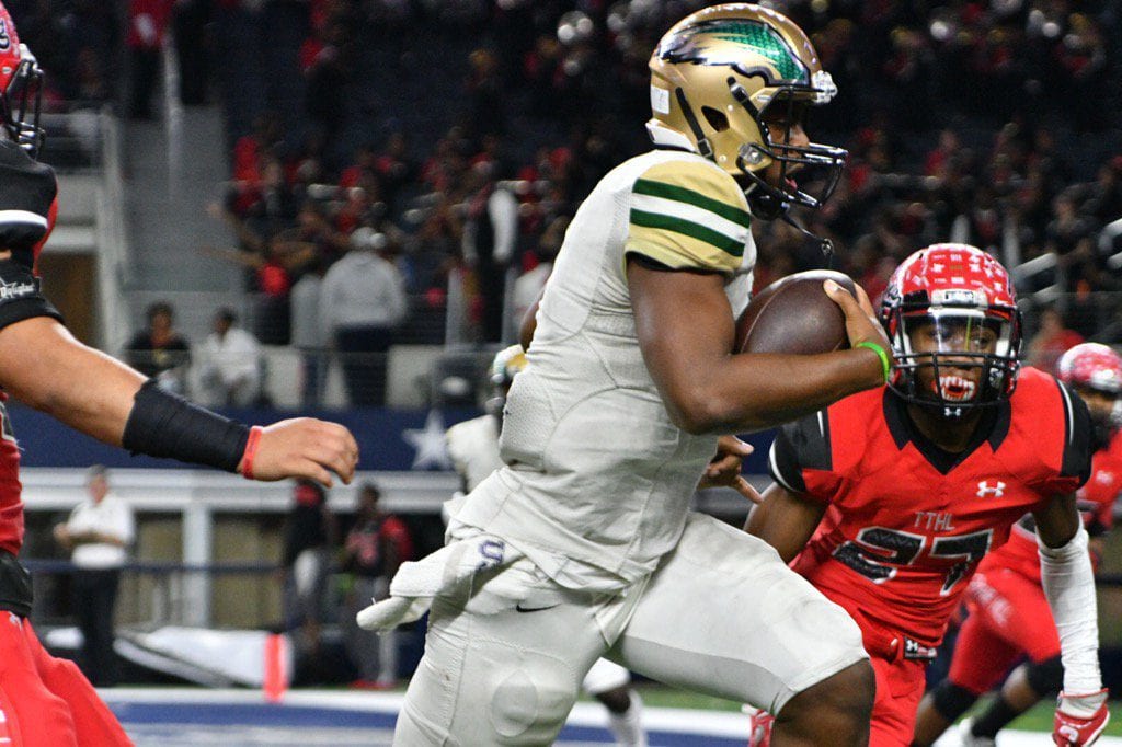 Dual threat quarterback Shawn Robinson proves his mettle with back to back options and rushes for DeSoto's fifth touchdown. Another botched snap results in a failed extra point, 33-13. (Vance Valentine/Special Contributor)