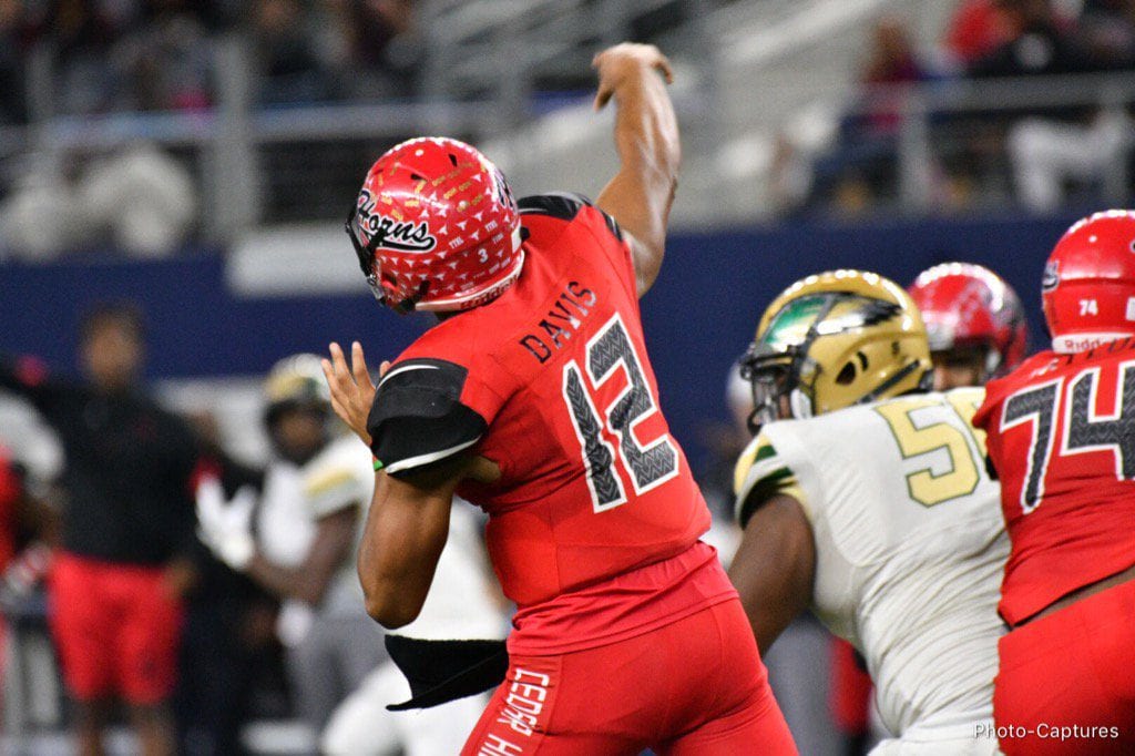 Cedar Hill QB Avery Davis launches a 60 yard pass to Charleston Rambo, to bring the score 21-13 in the second quarter. (Vance Valentine/Special Contributor)