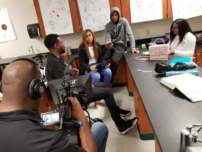 Weaver DHS Superintendent Weaver with students