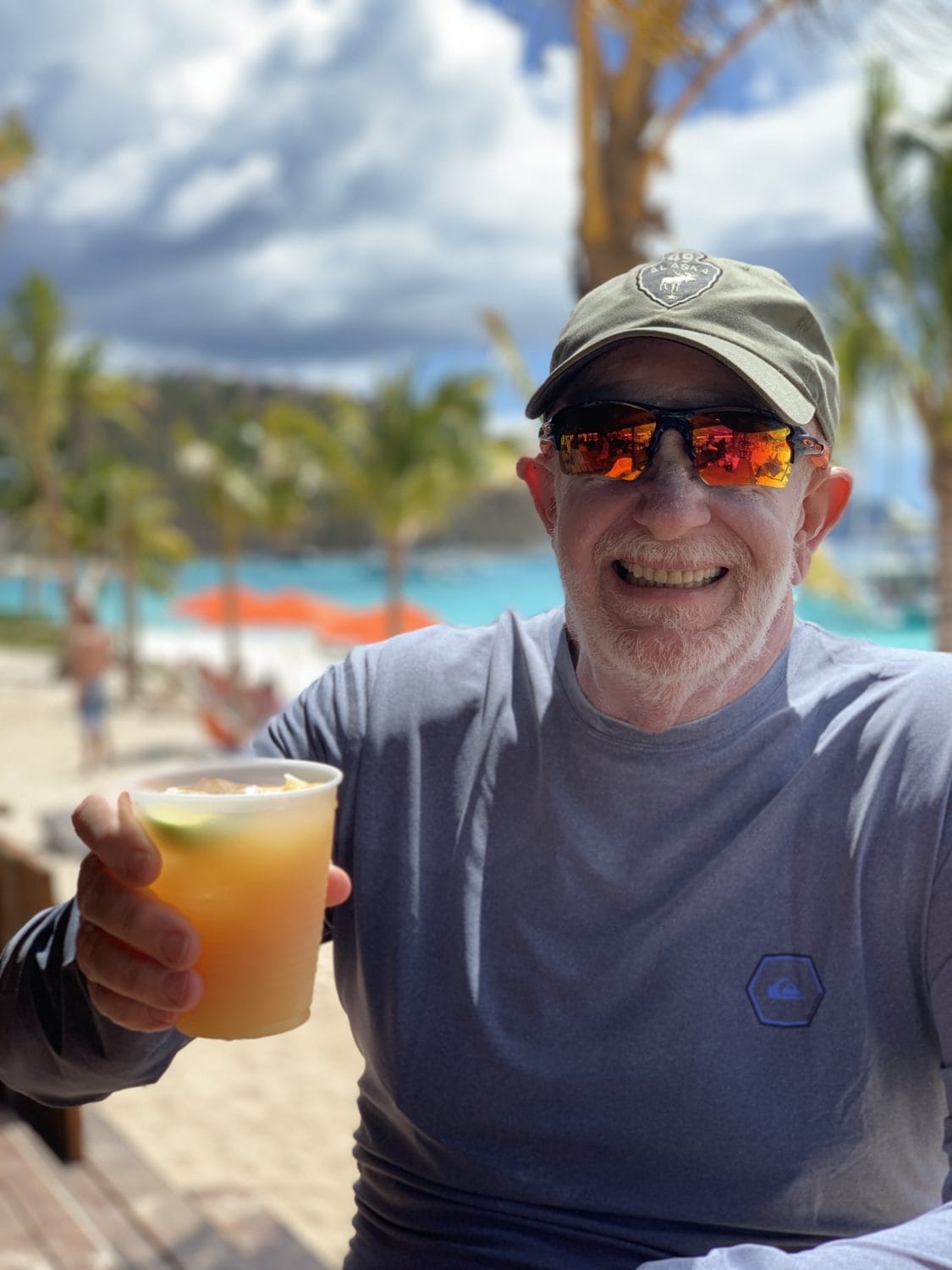 Man enjoying painkiller at Hendo's Hideout