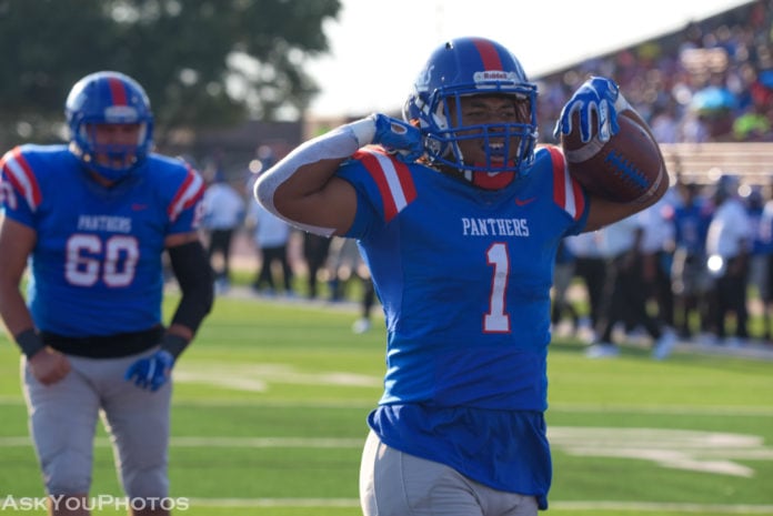 Trysten Smith flexed his muscle after he scored showing the fans Duncanville is Texas strong Duncanville vs. St. John's