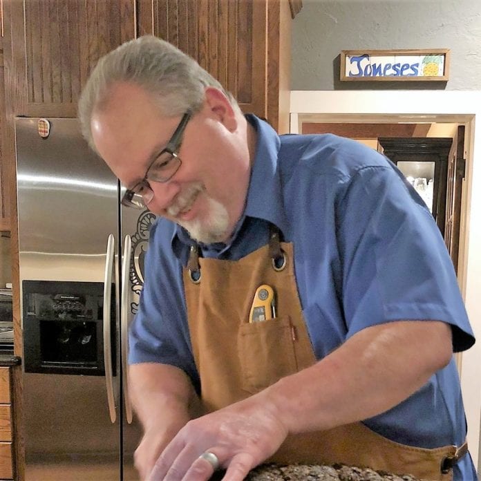 Jeff Hargrove slicing beef