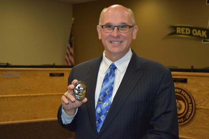 Chief Prasifka with ROISD badge