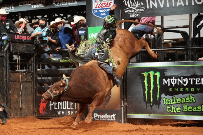 Cowboy riding a bull in Ft worth