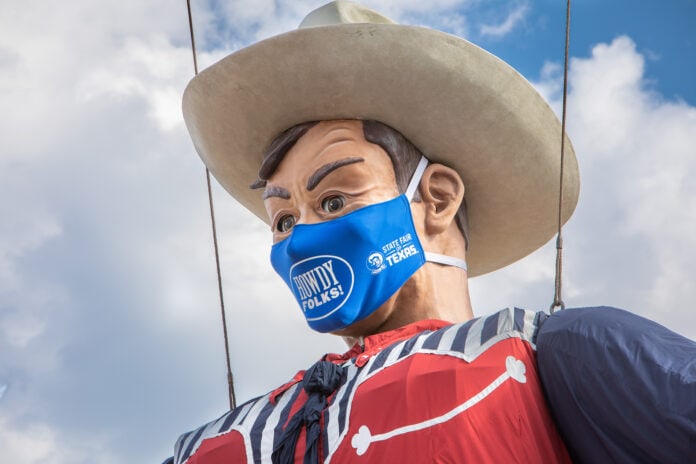 Big Tex wearing a mask