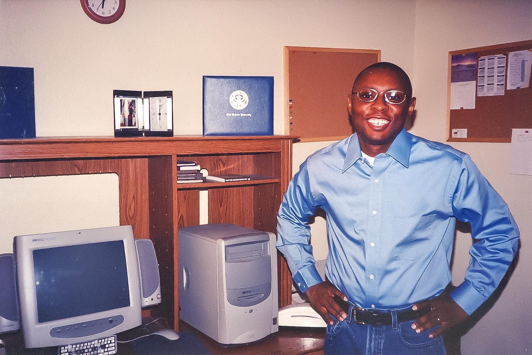 Kevin Graham in front of desk