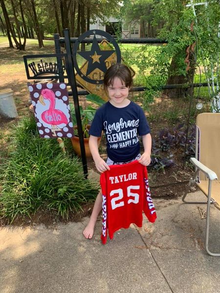 Midlothian first grader Adelynn Williams meets her hero