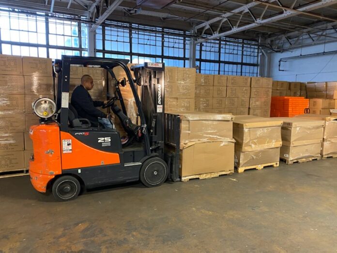 forklift unloading boxes