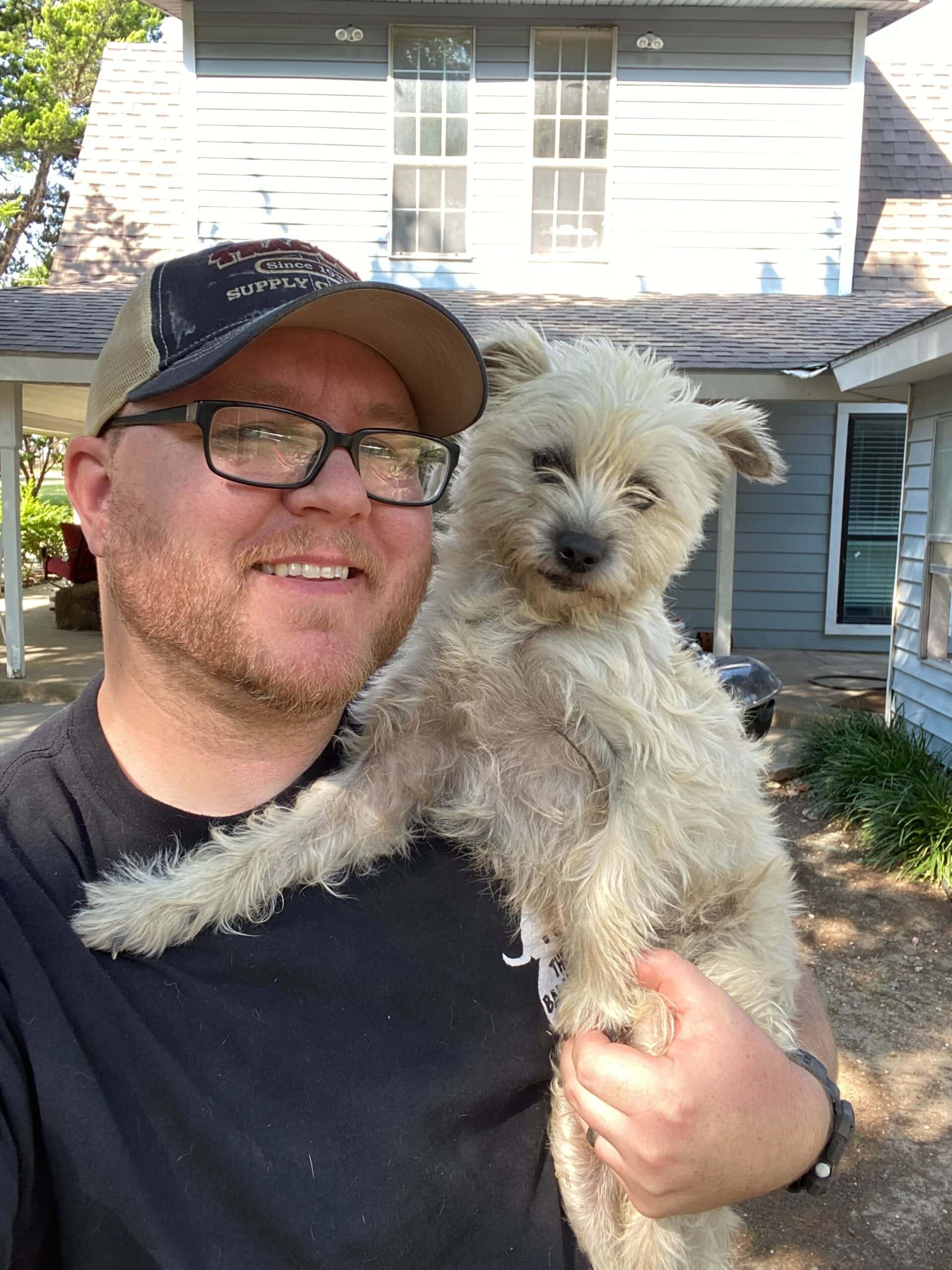 Matt Morris holding dog