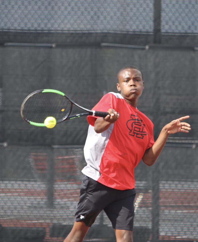 Tyrell Oliver playing tennis