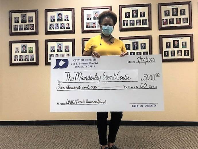 Woman holding check