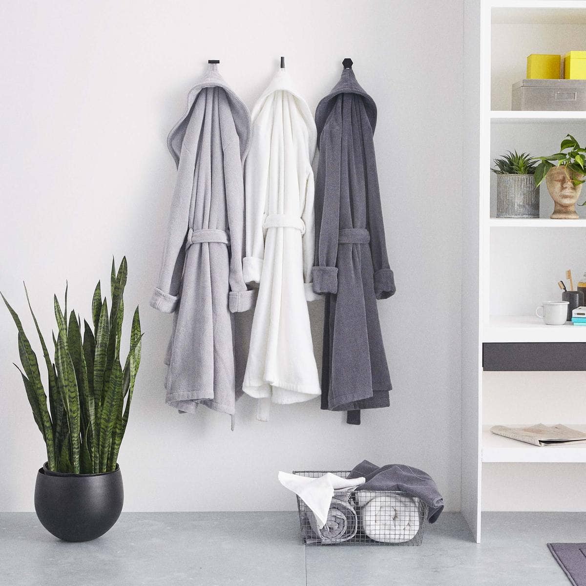 robes hanging on wall