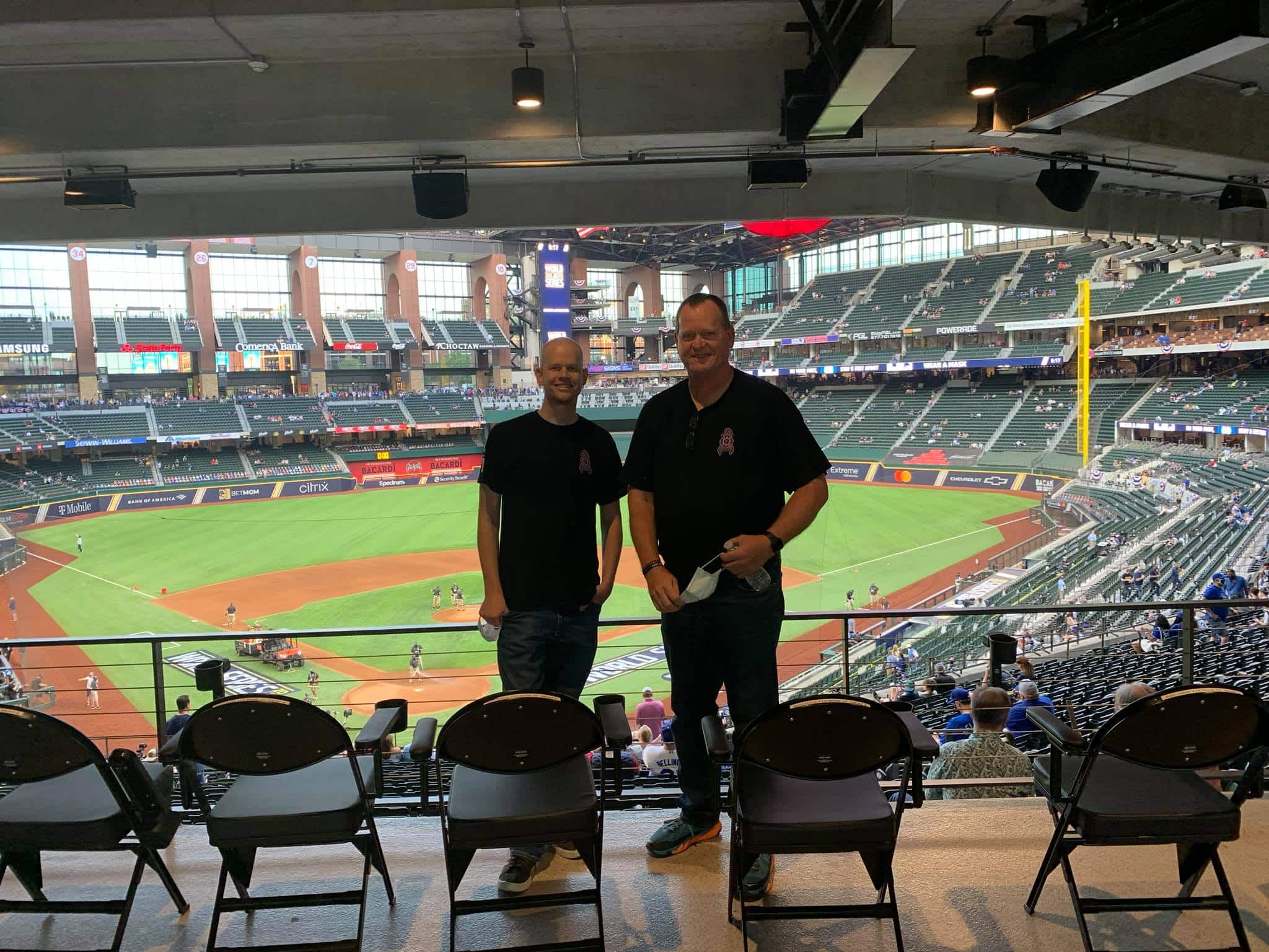 Brandon with Dad baseball stadium