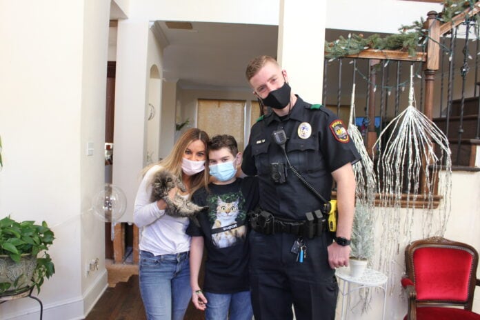 Police Officer with kitten