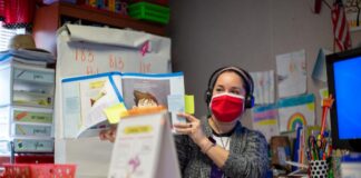 Teachers Receive Major Benefits Upgrade After Harmony School Board’s Unanimous Vote Teacher wearing a mask