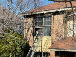 ladder in front of house
