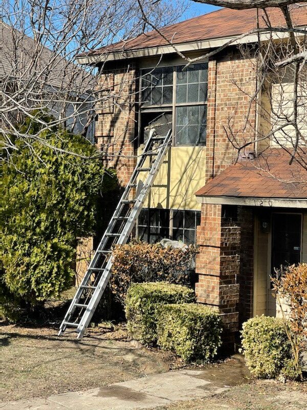 ladder in front of house