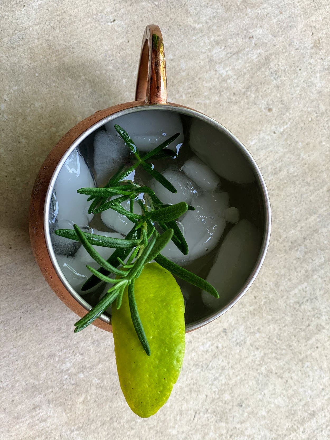 copper mug with ice and lime