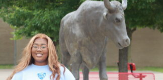 Cedar Hill Senior Headed to Johns Hopkins to Study Neuroscience Gia Henderson with Longhorn statue