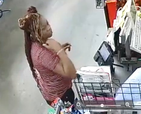Black lady in store checkout