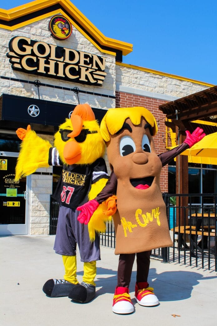 golden chick mascot with fletchers corny dog mascot
