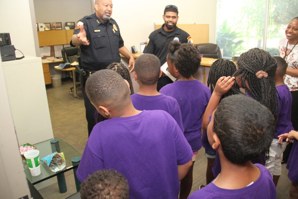 Robert D. Brown Jr. talks with students