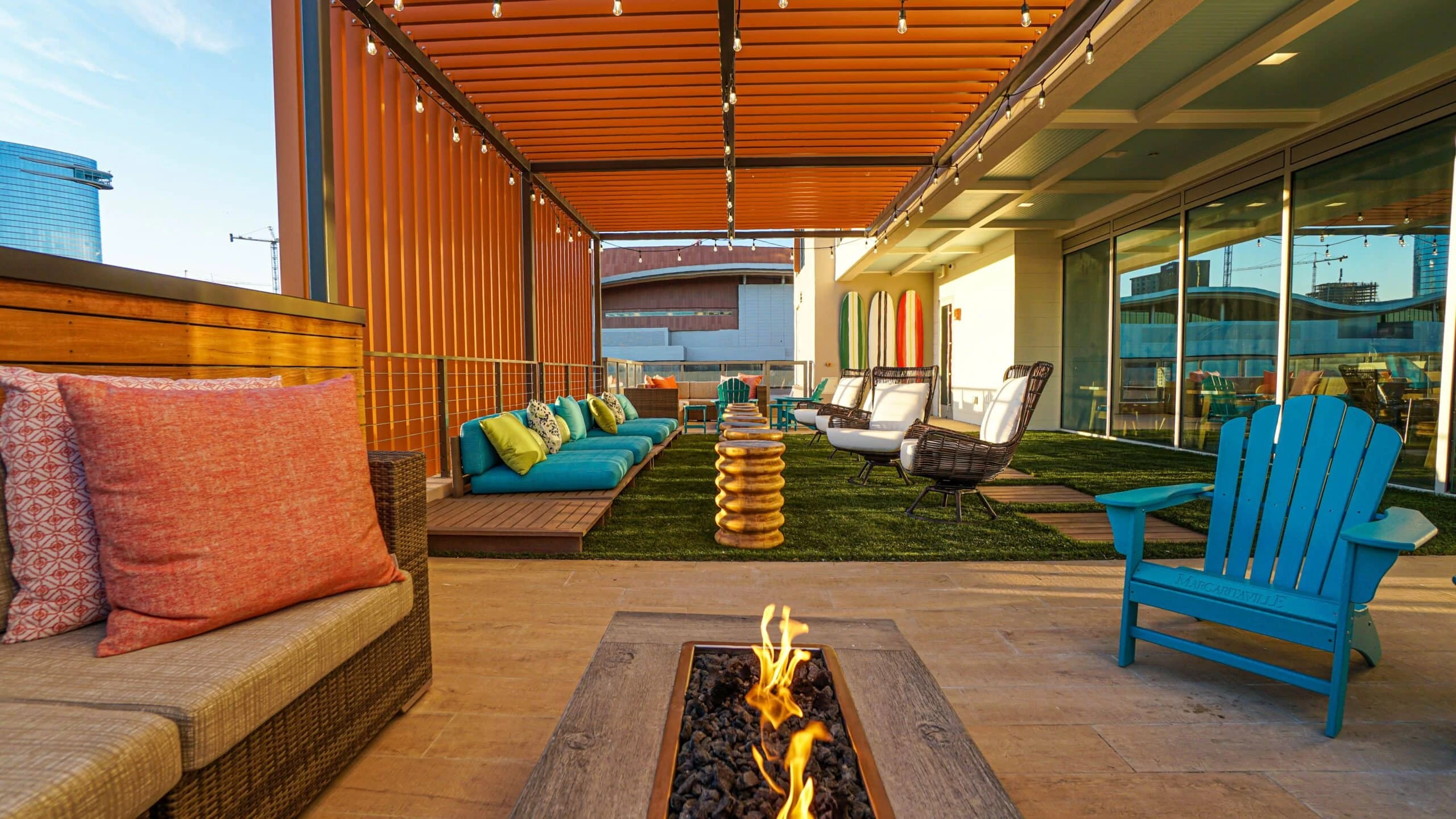 fire pit and couches on rooftop