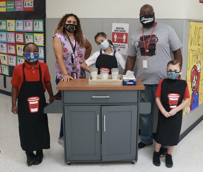 students with coffee cart