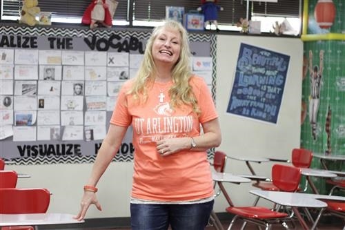 lady standing in front of board