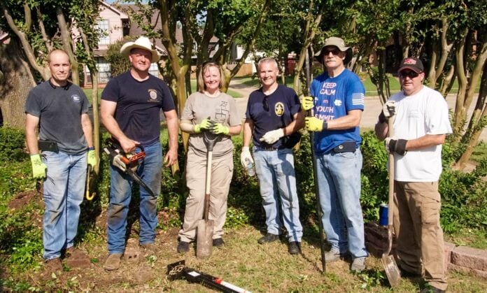 group of people with shovel