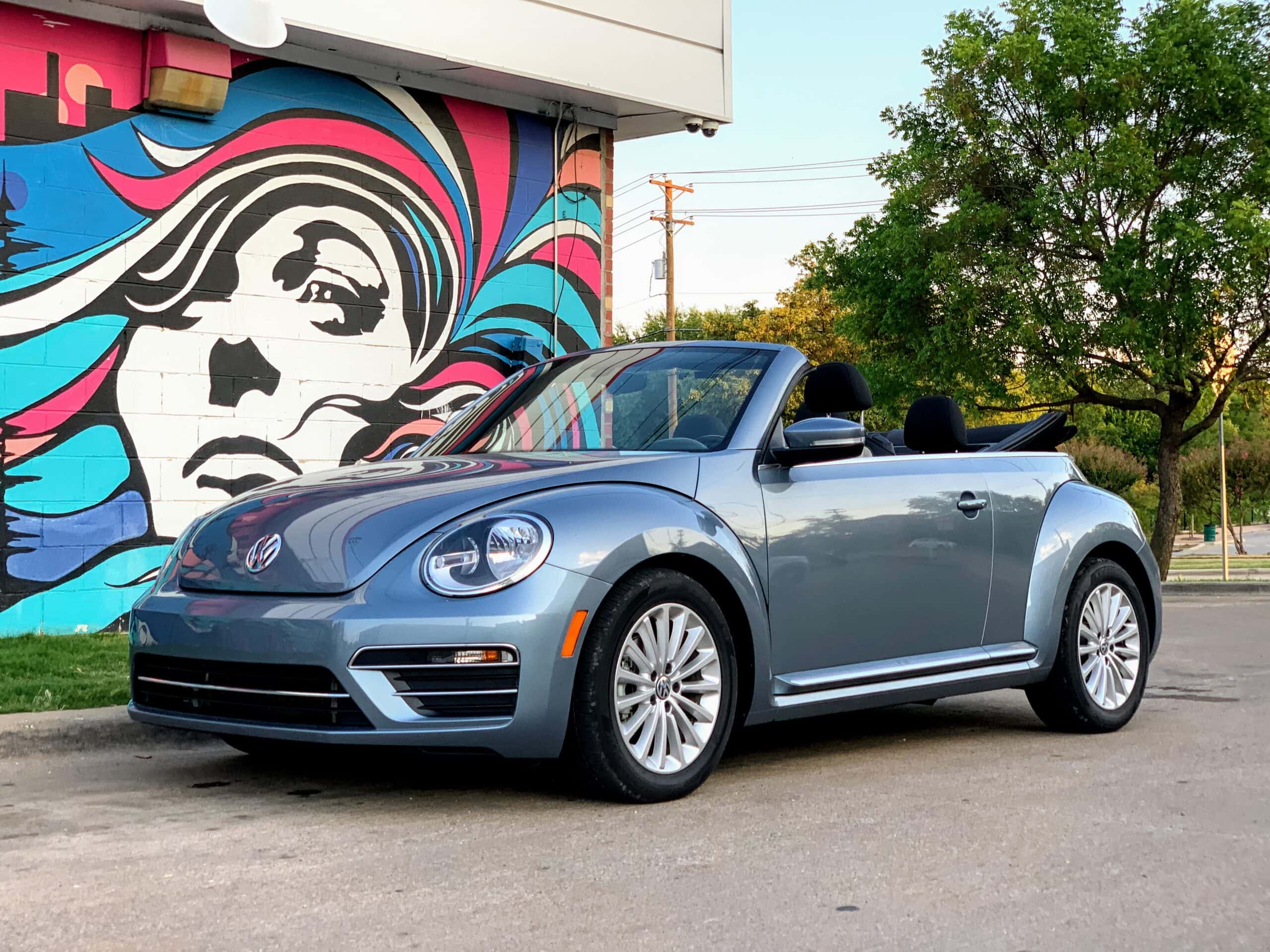 VW Beetle in front of Mural