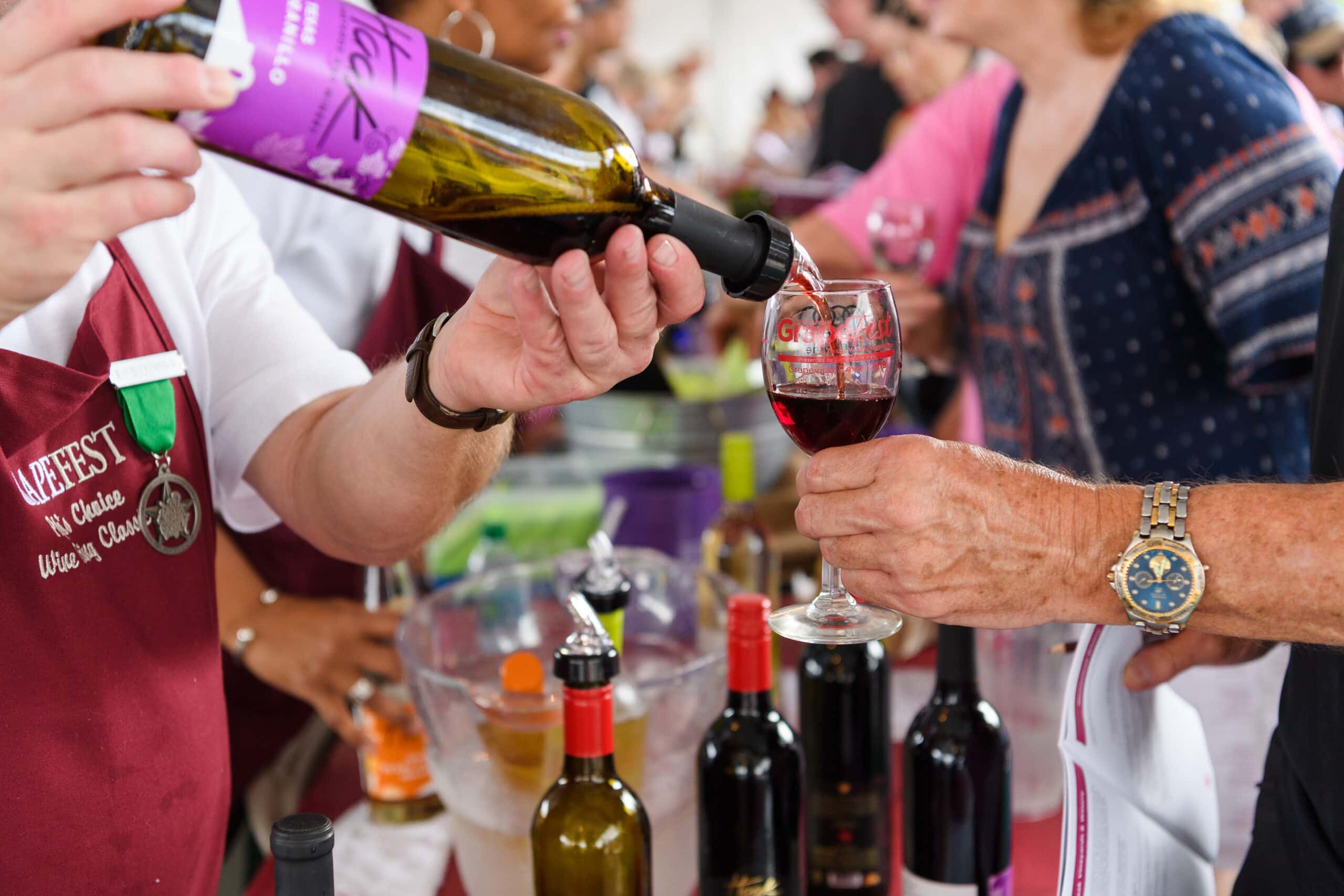 pouring wine into wine glass