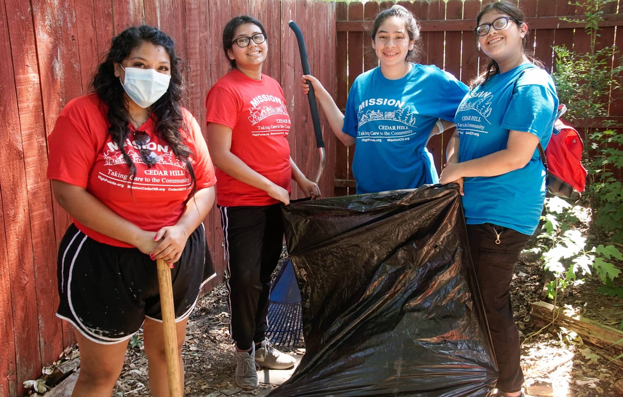 young people with trash bag