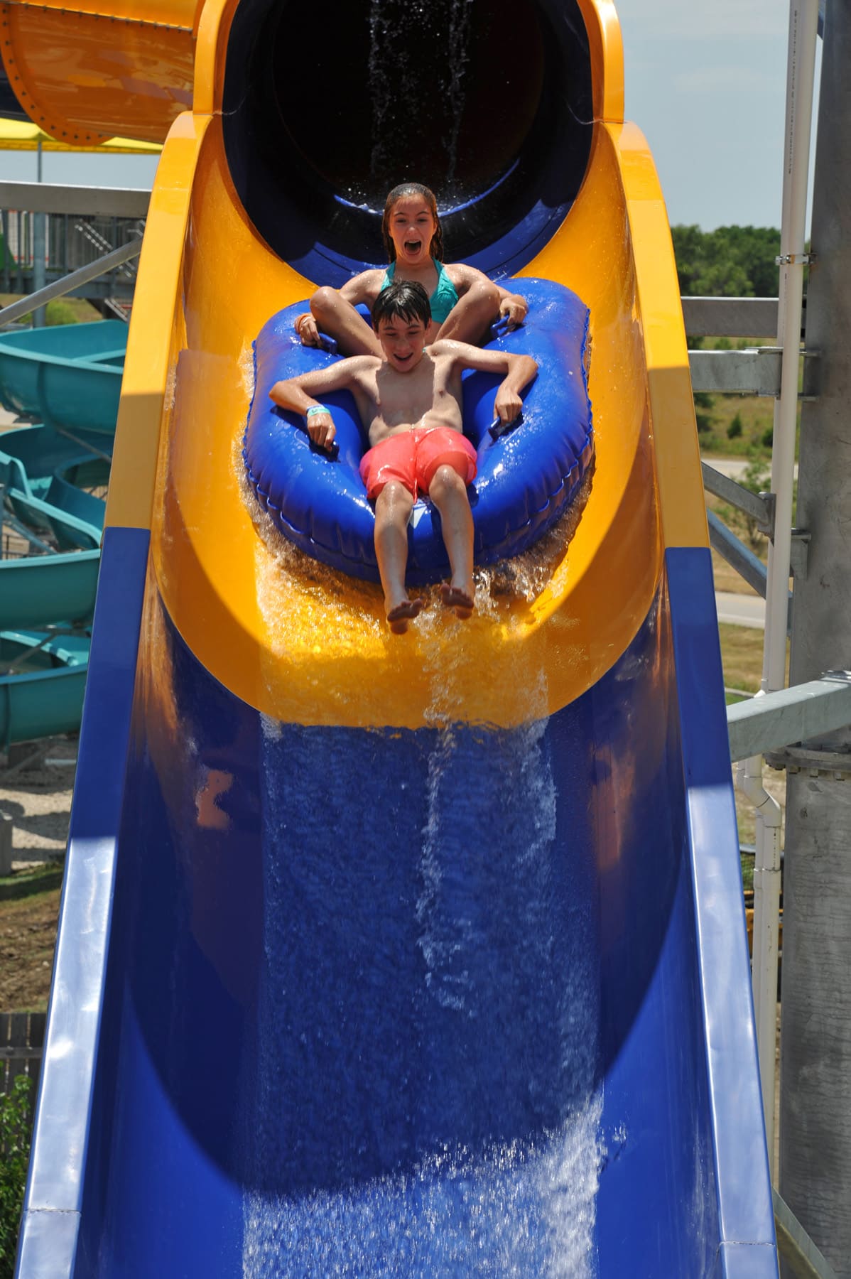 kids on waterslide