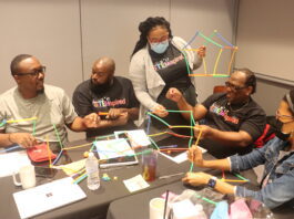 Cedar Hill Principals around a table