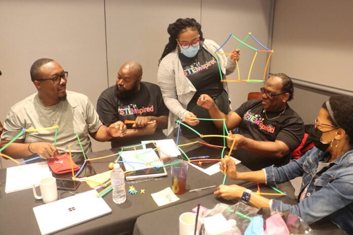 Cedar Hill Principals around a table