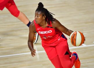 Always a Panther: Former Pantherette Representing USA in Tokyo Olympics Ariel Atkins dribbling basketball