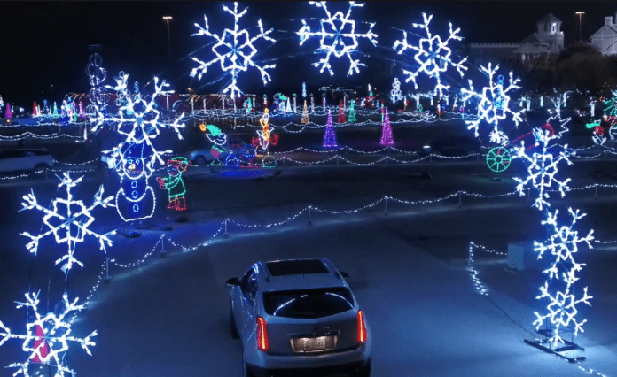 car at night with holiday lights