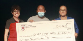 Cedar Hill ISD Education Foundation Presents $15,000 Check to CHISD Fine Arts people holding check from CHEF