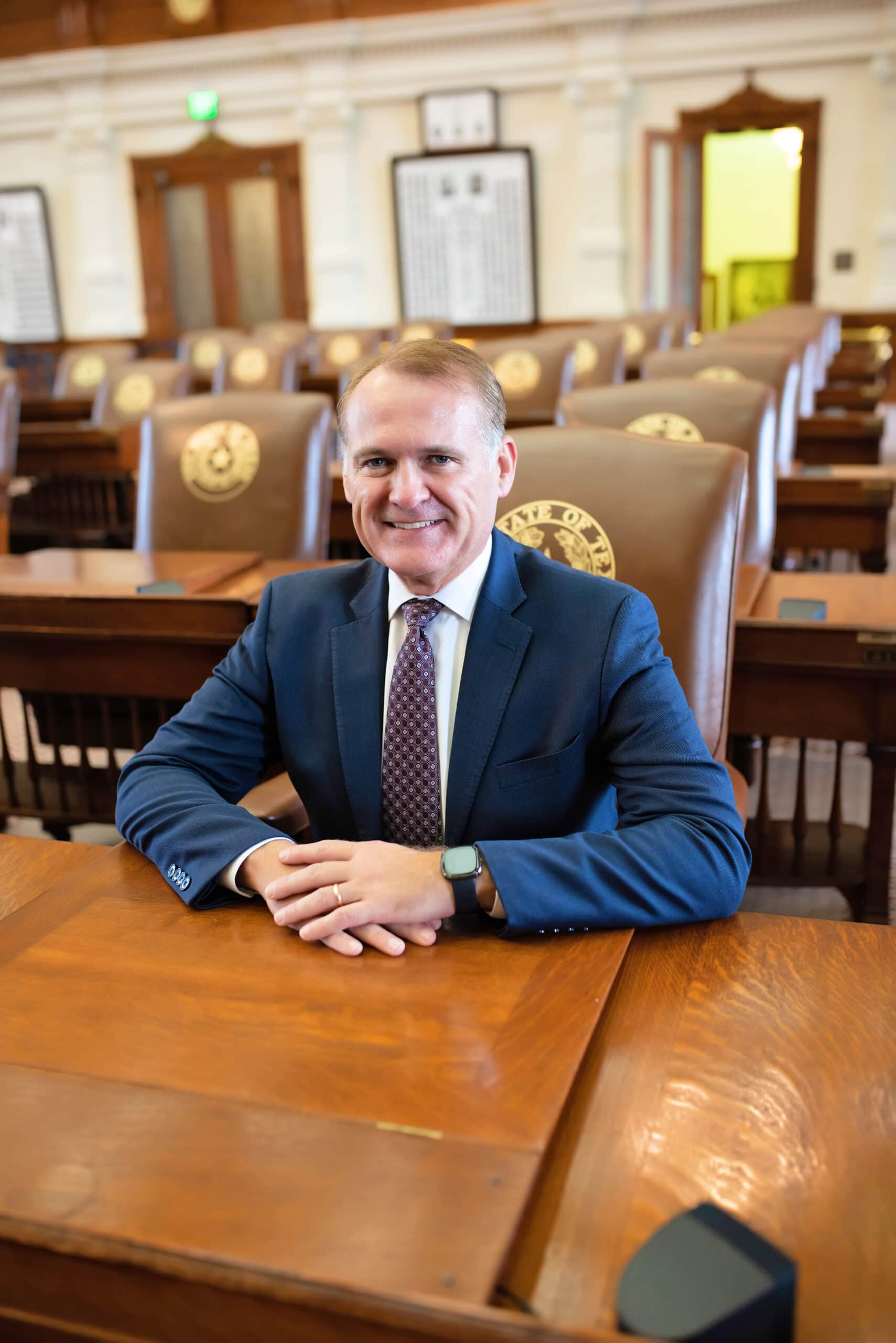 John Wray at desk