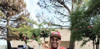 Cedar Hill Special Olympics Athletes Receive Letters Dylan Knox with letterman jacket