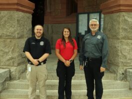 Ellis County employees on steps of courthouse